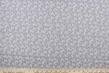 Load image into Gallery viewer, This fabric features a paisley design in white set against a gray background. 

