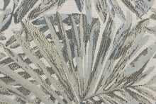 Load image into Gallery viewer, This jacquard fabric features a palm leaf design in gray, pale beige, pale blue and white . 
