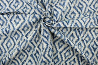 Kesara is a medium weight fabric that features a geometric design in denim blue, taupe and white.  This multi use fabric is perfect for light duty upholstery projects, window treatments (draperies, swags, valances) and toss pillows.  It has a soft workable feel yet is sturdy and durable.