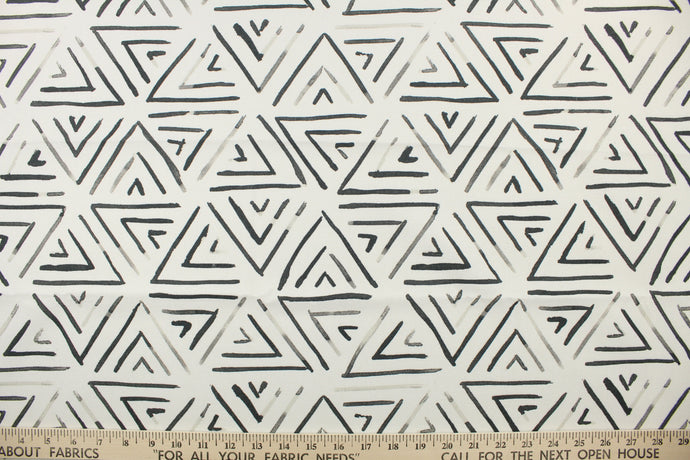  Post Modern is a medium weight, linen blend fabric featuring triangles in gray, black and white.  Perfect for window treatments, toss pillows, duvet covers and light upholstery.  This fabric offers a smooth hand and lovely drape.
