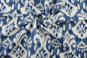 This multi use indoor/outdoor fabric features a distressed medallion design in indigo, cream and tan.  It is perfect for outdoor settings or indoors in a sunny room.  It is stain and water resistant and can withstand up to 500 hours of direct sun exposure.  Uses include decorative pillows, cushions, chair pads, tote bags and upholstery.  