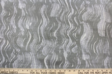 Load image into Gallery viewer, This jacquard features a vertical wavy design in gray and sliver with hints of pale purple. 
