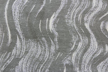 Load image into Gallery viewer, This jacquard features a vertical wavy design in gray and sliver with hints of pale purple. 
