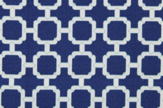 This multi use outdoor fabric features a geometric design in white against a navy blue background.  It is stain and water resistant and can withstand up to 500 hours of direct sun exposure.  Uses include decorative pillows, cushions, chair pads, tote bags and upholstery.  We offer this fabric in several different colors.