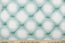 Load image into Gallery viewer, Stebbins features a distressed geometric design in teal and white, with a soil and stain repellant finish.  Perfect for window treatments, decorative pillows, handbags, light duty upholstery applications and almost any craft project.  This fabric has a soft workable feel yet is stable and durable.  We offer this fabric in other colors.
