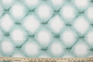 Stebbins features a distressed geometric design in teal and white, with a soil and stain repellant finish.  Perfect for window treatments, decorative pillows, handbags, light duty upholstery applications and almost any craft project.  This fabric has a soft workable feel yet is stable and durable.  We offer this fabric in other colors.