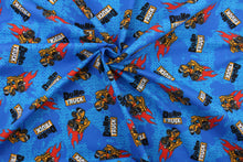 Load image into Gallery viewer, This fabric features a playful dump design in red, yellow, black, white, and gray set against a blue background.
