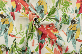 This multi use printed fabric features bright colored parrots perched on lush jungle branches.  Colors included are red, yellow, blue, brown and green on an off white background.  Perfect for window treatments, decorative pillows, handbags, light duty upholstery applications and almost any craft project.  This fabric has a soft workable feel yet is stable and durable.