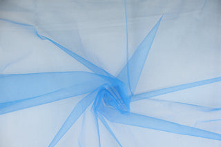 A sheer, semi firm, netting tulle in true blue . 