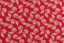 Load image into Gallery viewer, This fabric features a whimsical floral design in white on a red background. 
