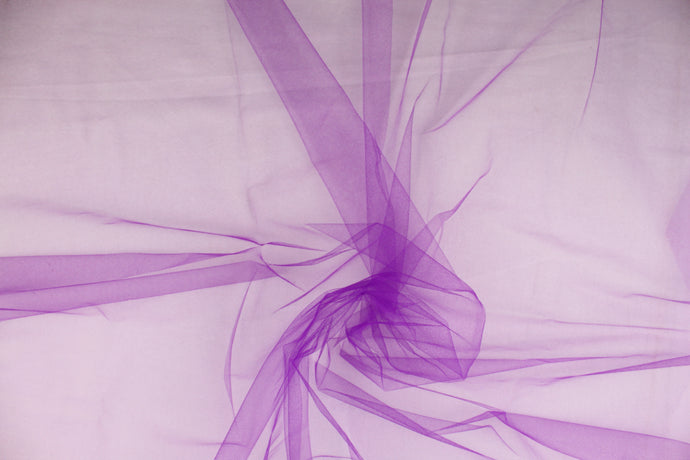  A sheer, semi firm, netting tulle in a rich violet. 