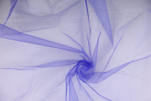 A sheer, semi firm, netting tulle in royal blue .