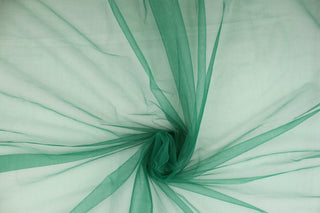 A sheer, semi firm, netting tulle in a rich green . 