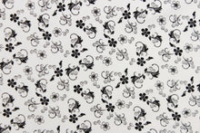 Load image into Gallery viewer, This fabric features a vine and floral design in black set against a white background.
