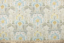 Load image into Gallery viewer,  Holyoke is a medium weight screen printed fabric on cotton duck with a soil and stain repellant finish.  It features a large leaf design in cream, shades of blue and green, charcoal, grey, gold, mustard and brown.  This multi use fabric is perfect for light duty upholstery projects, window treatments (draperies, swags, valances) and toss pillows.

