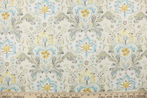  Holyoke is a medium weight screen printed fabric on cotton duck with a soil and stain repellant finish.  It features a large leaf design in cream, shades of blue and green, charcoal, grey, gold, mustard and brown.  This multi use fabric is perfect for light duty upholstery projects, window treatments (draperies, swags, valances) and toss pillows.