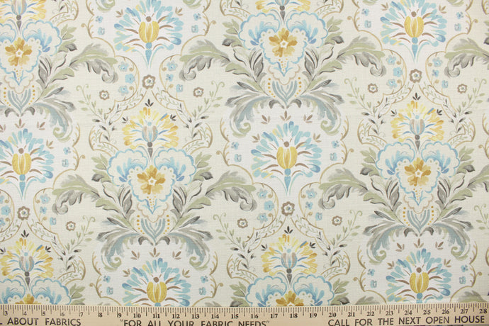  Holyoke is a medium weight screen printed fabric on cotton duck with a soil and stain repellant finish.  It features a large leaf design in cream, shades of blue and green, charcoal, grey, gold, mustard and brown.  This multi use fabric is perfect for light duty upholstery projects, window treatments (draperies, swags, valances) and toss pillows.