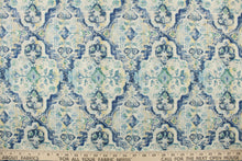 Load image into Gallery viewer,  Stanbury Cliffside is a printed linen blend fabric featuring a distressed medallion design in shades of blue, green, light yellow and off white.  This multi use fabric is perfect for light duty upholstery projects, window treatments (draperies, swags, valances) and toss pillows.

