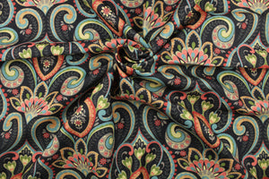 This multi use indoor/outdoor fabric features a large paisley design in red, light orange, turquoise, green, taupe and light yellow on a black background.  It is family friendly and perfect for outdoor settings or indoors in a sunny room.  It is stain and water resistant and can withstand up to 500 hours of direct sun exposure.  Uses include decorative pillows, cushions, chair pads, tote bags and upholstery.  