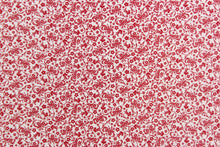 Load image into Gallery viewer, This fabric features a tiny floral design in red set against a white background.
