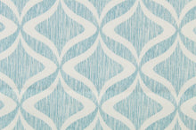 Load image into Gallery viewer, This printed fabric features a geometric design in white against thin vertical  aqua lines.  Perfect for window treatments, decorative pillows, handbags, light duty upholstery applications and almost any craft project.  This fabric has a soft workable feel yet is stable and durable.
