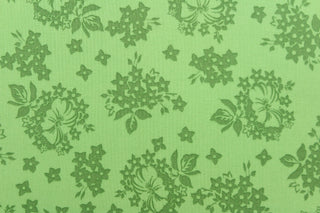  A floral design in green .