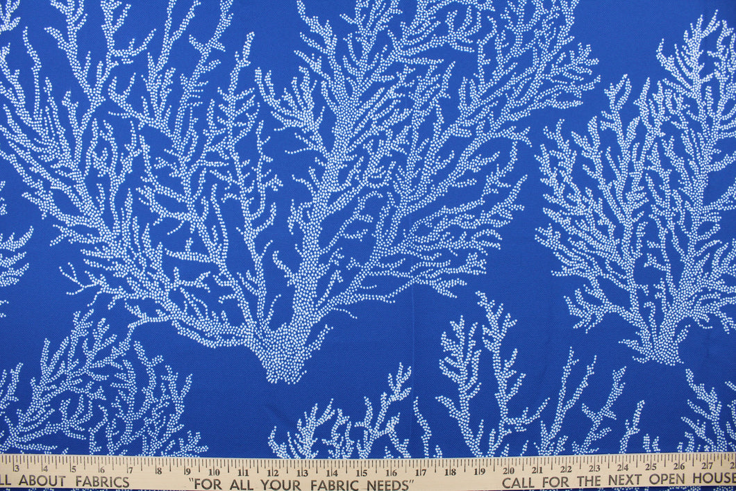 Keywest is a multi use fabric featuring a sea coral design in white against a marine blue background.  It is perfect for window treatments, decorative pillows, custom cushions, bedding, light duty upholstery applications and almost any craft project.  This fabric has a soft workable feel yet is stable and durable.