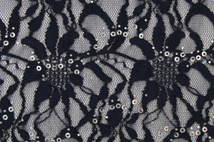 This stretch lace features a intricate floral design with shimmering sliver sequins adding to its elegance.  It is sheer and breathable with a nice soft drape.  Uses include, apparel, dancewear, costumes, curtains and home decor.
