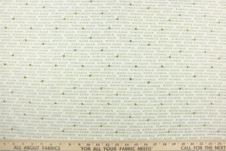 This quilting fabric feature  a Downtown Abbey print with a bit of holly in green against a white background .