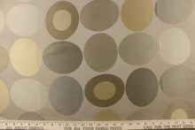 Load image into Gallery viewer, Geometric pattern of circles and ovals in gold and pewter or gray tones on a khaki background
