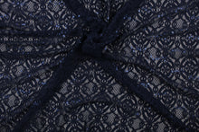 Load image into Gallery viewer, This stretch lace features a intricate medallion design in navy blue with shimmering sequins adding to its elegance.  It is sheer and breathable with a nice soft drape.  Uses include, apparel, dancewear, costumes, curtains and home decor.
