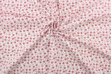 Load image into Gallery viewer, This fabric features a  floral design in red set against a white background.

