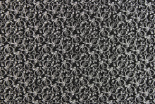 Load image into Gallery viewer, This fabric features a tiny floral vine design in white set against a black background.
