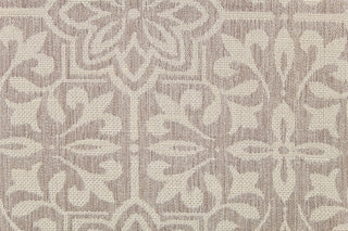 This jacquard fabric features a large-scale floral design in shades of linen and light brown