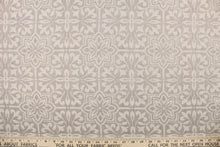 Load image into Gallery viewer, This jacquard fabric features a large-scale floral design in shades of linen and light brown
