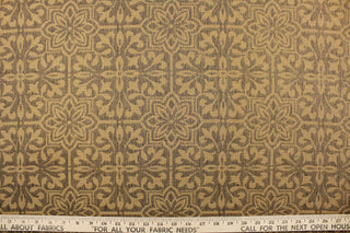 This jacquard fabric features a large-scale floral design in chocolate brown and dark beige.
