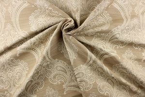 ornamental damask design in cream tones on a khaki background