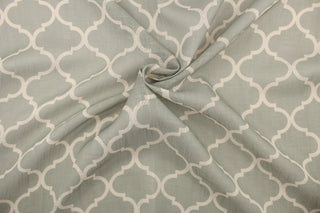 Lismore is a semi sheer fabric featuring a lattice design in beige and grey. 