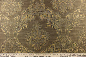 ornamental damask design in gold and gray and hints of  black on a gold and black background