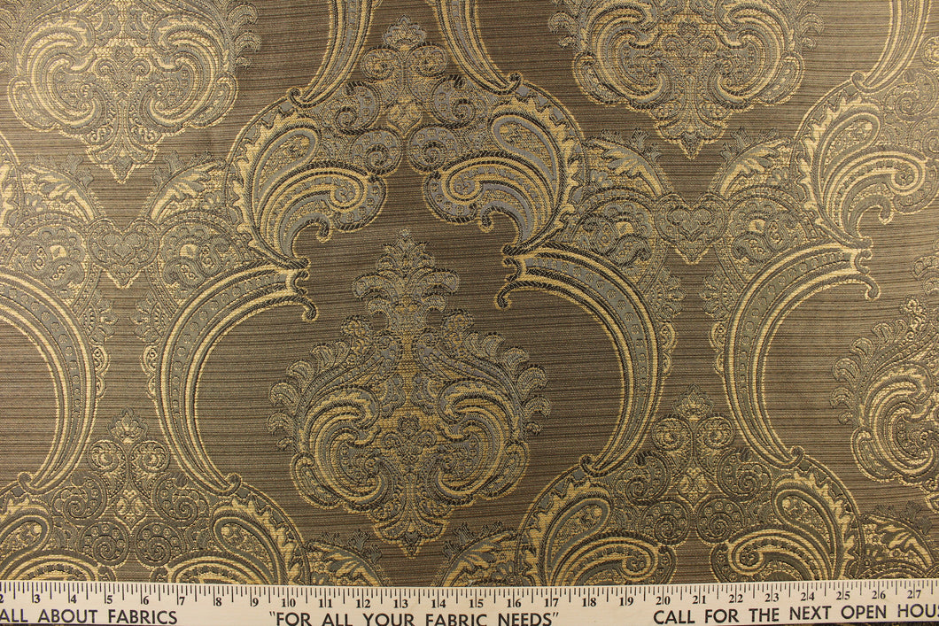 ornamental damask design in gold and gray and hints of  black on a gold and black background