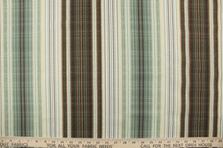 This multi use print fabric features a line design in the colors of shades of green, brown and light beige.  It is perfect for window treatments, decorative pillows, custom cushions, bedding, light duty upholstery applications and almost any craft project.  This fabric has a soft workable feel yet is stable and durable.