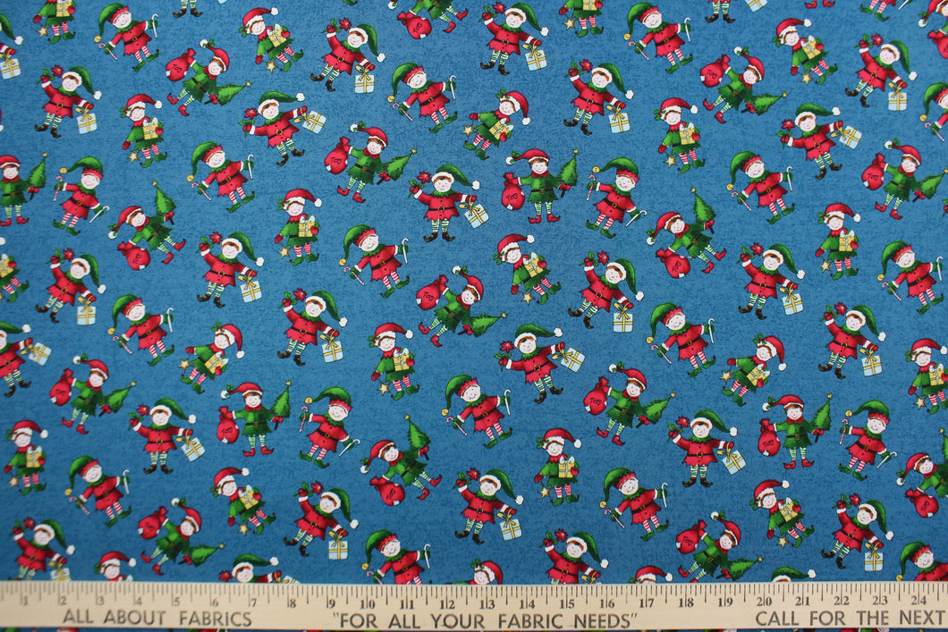  This quilting print features a Christmas design of elves in pale blue, white, red, green, brown, black and golden yellow set against a dark blue background. 