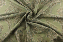 Load image into Gallery viewer, ornamental damask design in varying shades of green and hints of light gold on a green background
