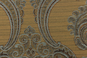 ornamental damask design in blue and brown and hints of copper or dark gold on a gold tone background
