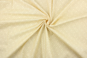  This quilting fabric features a Downton Abbey print in gold and pale beige. 