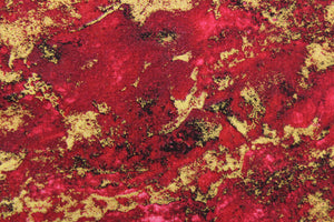  A marble design in dark red, burgundy, gold and hints of black .