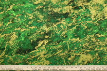 Load image into Gallery viewer, A marble design in varying shades of green and gold with hints of black . 
