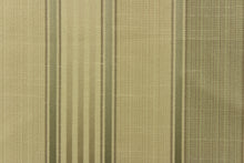 Load image into Gallery viewer, Offering  varying  width striped pattern in colors of light green and light khaki or beige along with a slight sheen to enhance the various colors

