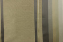 Load image into Gallery viewer, Rich and formal describe this medium weight yarn dye fabric which  features a multi width striped pattern in colors of gold, gray and khaki or beige .
