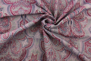 This tapestry fabric features a vibrant demask design in light purple, blue, taupe and burgundy purple .